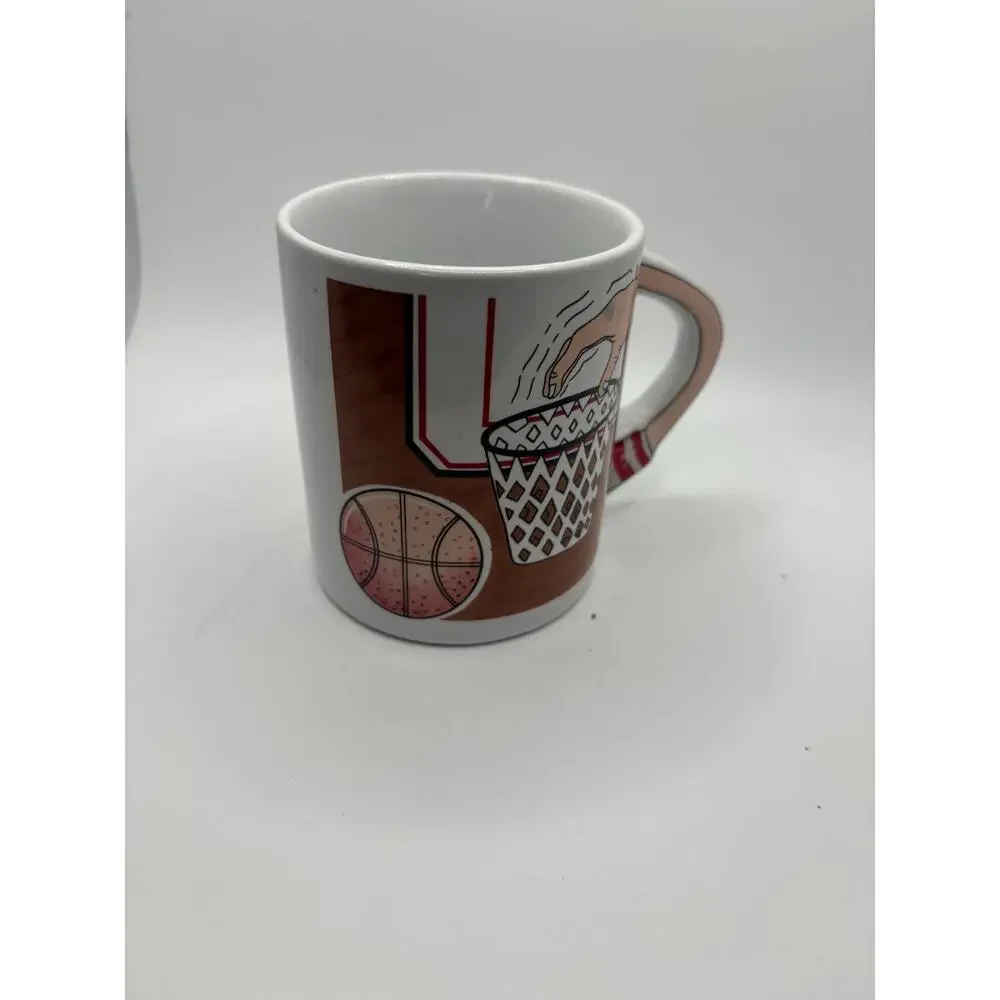 Very Unique Basketball Coffee Mug handle is the arm dunking basketball